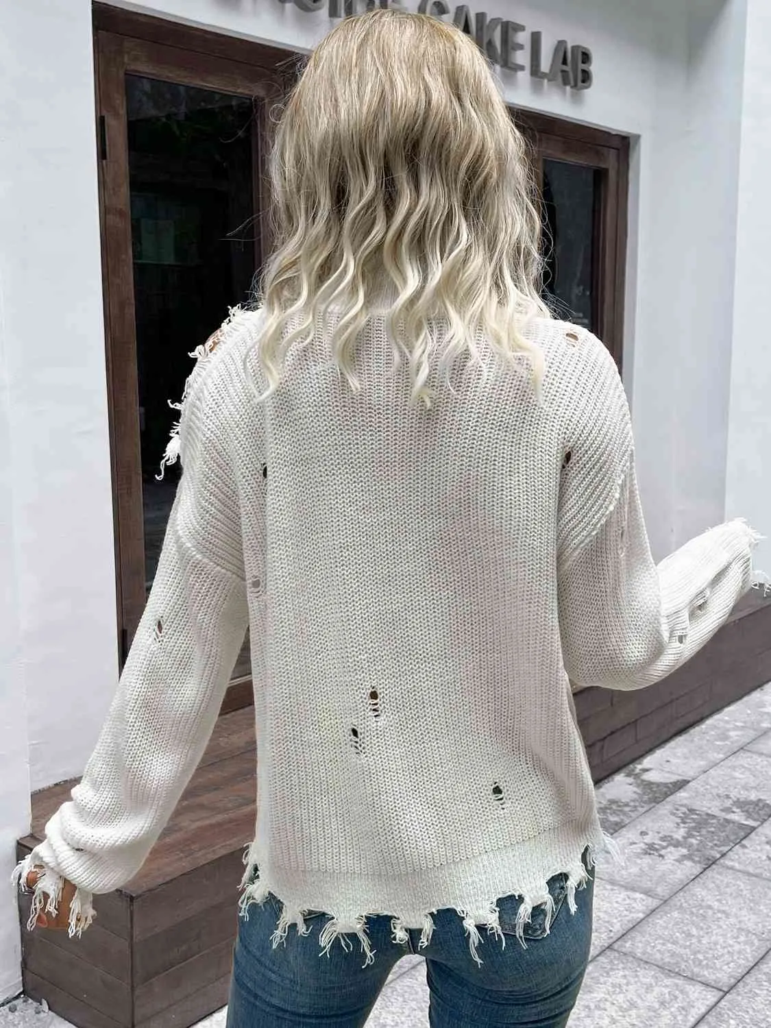 Distressed High Neck Cold-Shoulder Sweater