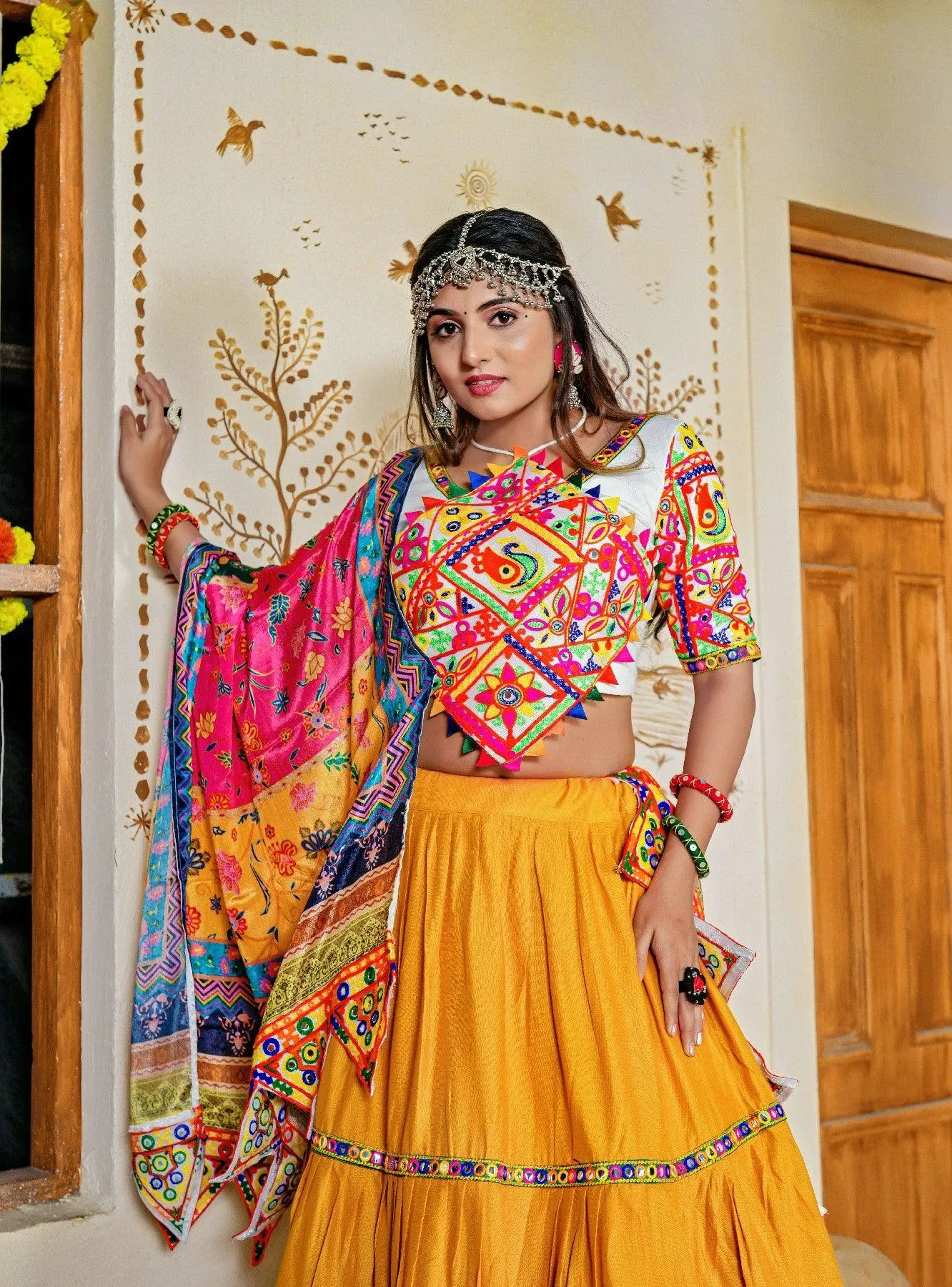 Three Tal Traditional Rayon Navratri Lehenga Choli Set