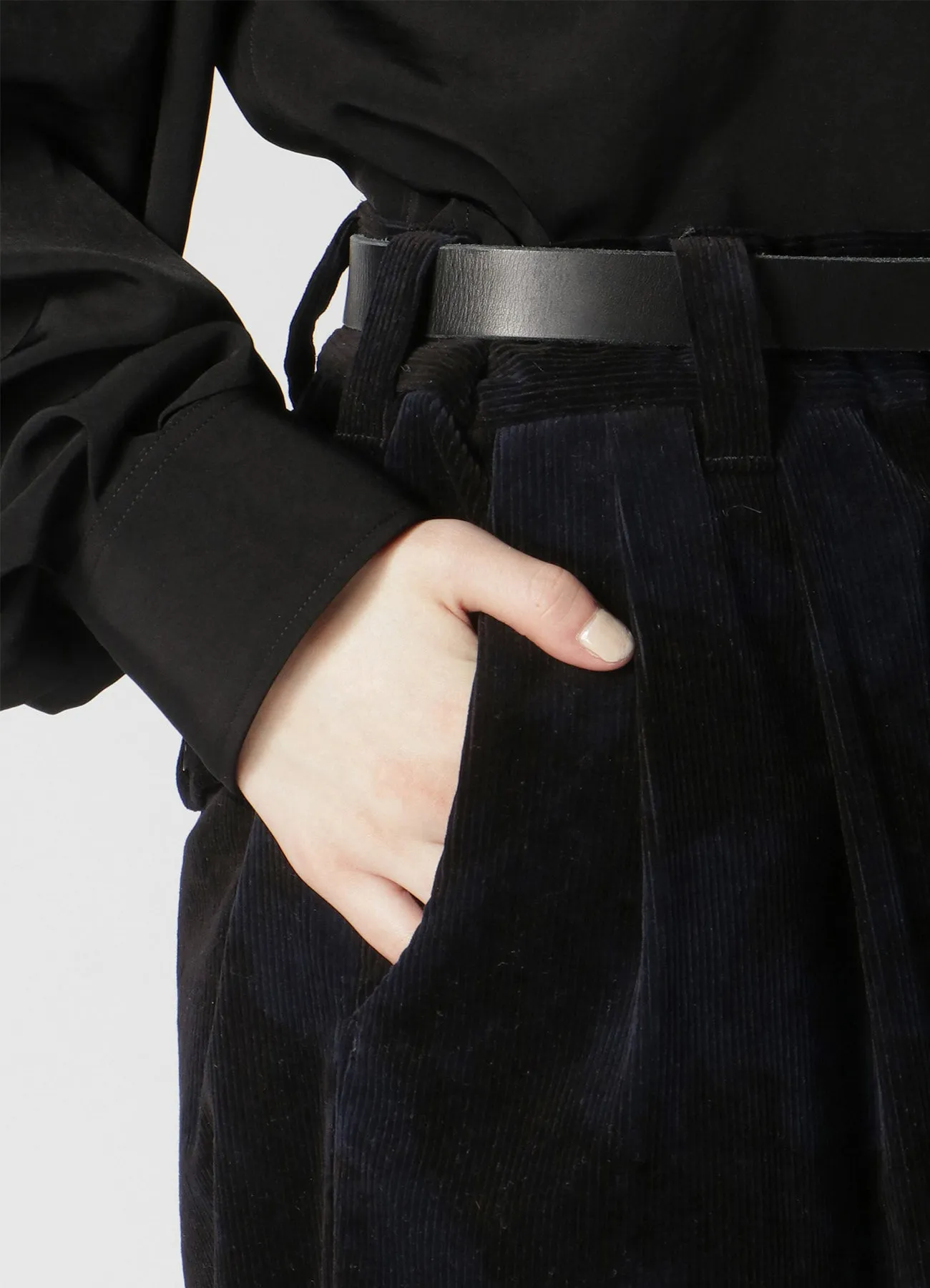 UNEVEN DYED CORDUROY 2 TUCK WIDE CUFFED PANTS